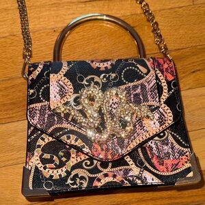 Aldo Black and Pink Mini Bag with Gold Accents